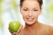 Beautiful woman with  apple