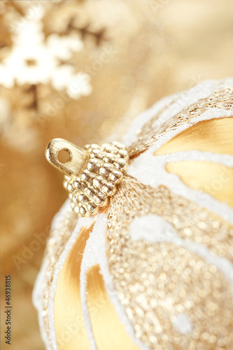 Photo: Golden Christmas decoration close-up Golden Christmas decoration close-up