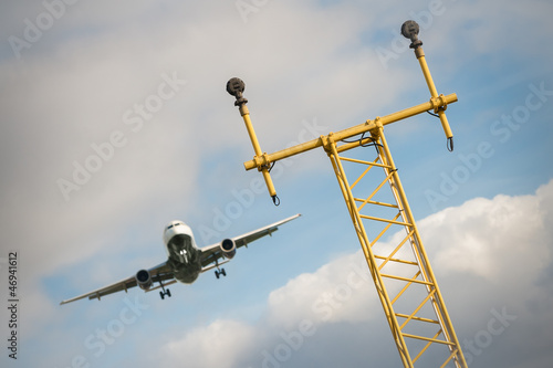 Photo: passenger jet on a runway flightpath passenger jet on a runway flightpath