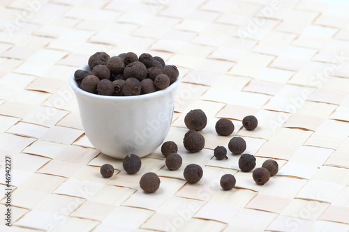 Photo: Allspice berries in a white pot Allspice berries in a white pot
