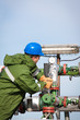 The worker of the oil and gas refinery