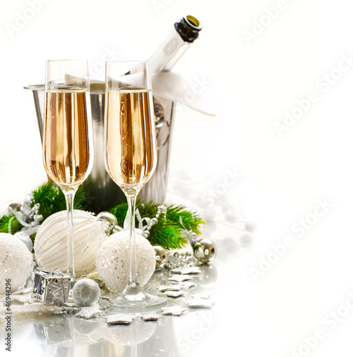 Photo: New Year Celebration. Two Champagne Glasses New Year Celebration. Two Champagne Glasses