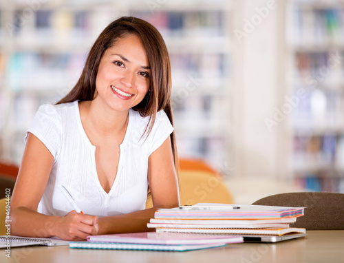 Photo: Female student at the library Female student at the library