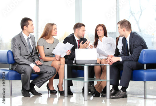 Photo: business team in business meeting business team in business meeting