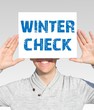 Mann Schild Wintercheck