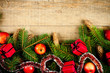 christmas fir tree with pinecones, apples and decorations