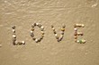 Photo: Love stones on sand beach Love stones on sand beach