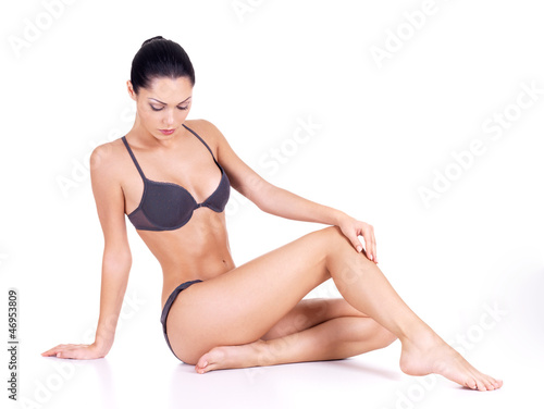 Photo: Beautiful woman with perfect slim body Beautiful woman with perfect slim body