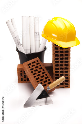 Photo: Brick, yellow hard hat, tools Brick, yellow hard hat, tools
