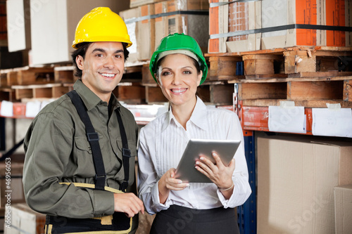 Photo: Supervisor Instructing Foreman At Warehouse Supervisor Instructing Foreman At Warehouse