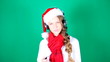 Little girl Santa listening to music