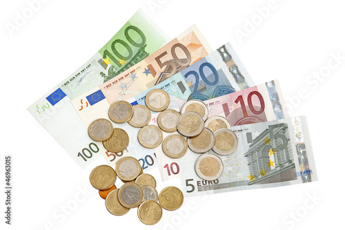 Photo: Euro banknotes and coins isolated on white background Euro banknotes and coins isolated on white background