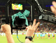 TV Camera shoots fans sector during match