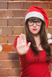 christmas woman doing a stop gesture