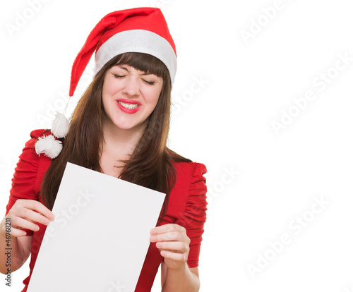 Photo: upset christmas woman holding a blank card upset christmas woman holding a blank card
