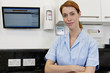 A female dental nurse in a dental surgery