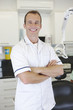 A male dentist in a dental surgery