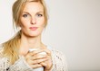 Woman with Unkept Hair Holding a Cup of Coffee