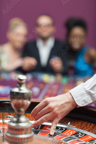 Photo: People waiting for roulette wheel People waiting for roulette wheel