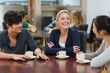 Photo: Friends enjoying coffee Friends enjoying coffee