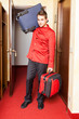 Tired Bellboy with Luggages