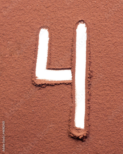 Photo: Number 4 made of cocoa powder Number 4 made of cocoa powder
