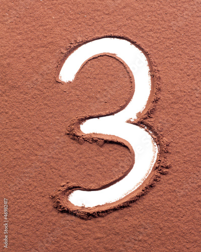 Photo: Number 3 made of cocoa powder Number 3 made of cocoa powder