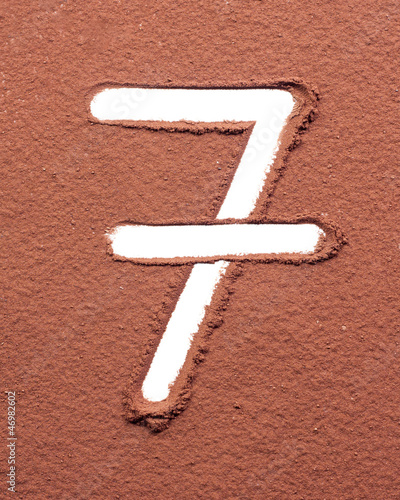 Photo: Number 7 made of cocoa powder Number 7 made of cocoa powder