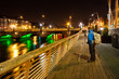 Man taking photos at night