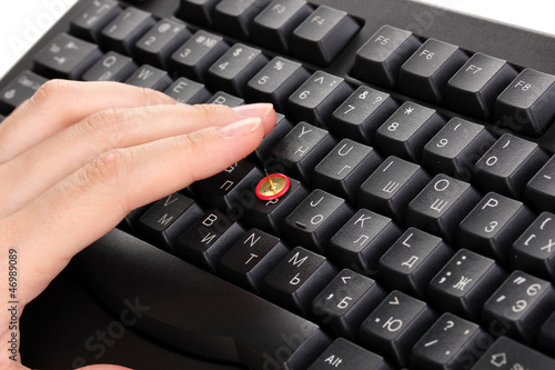 Photo: Painful typing on keyboard close-up Painful typing on keyboard close-up