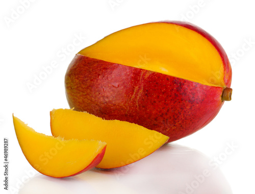 Photo: Ripe appetizing mango isolated on white Ripe appetizing mango isolated on white