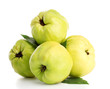 sweet quinces with leaves, isolated on white