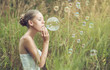 girl starts soap bubbles