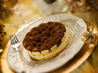 tiramisu over golden table, selective focus