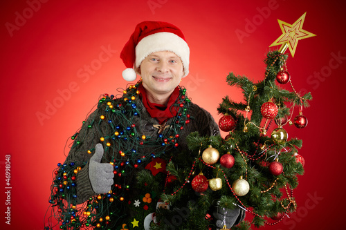 Photo: Man with xmas tree Man with xmas tree