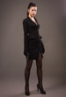 Spy girl in a black with gun