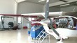 Airplane Hanger Mechanics at Work