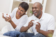 Photo: African American Couple Playing Video Console Game African American Couple Playing Video Console Game