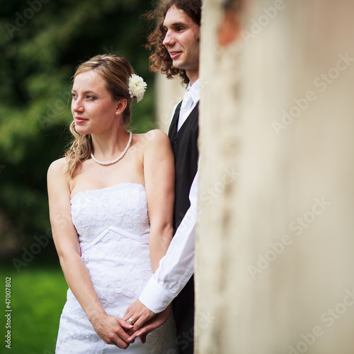 Photo: Portrait of a young wedding couple Portrait of a young wedding couple