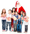 Santa Claus with a group of kids