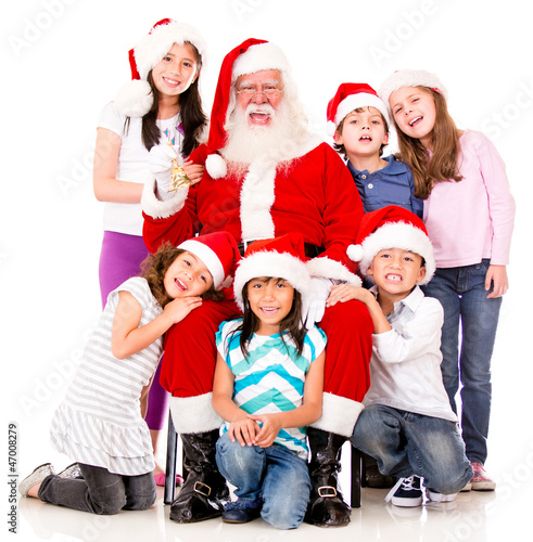 Photo: Santa with a group of kids Santa with a group of kids