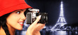 Tourist woman with a camera.