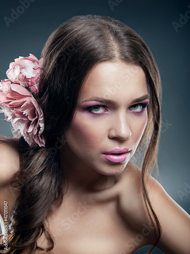 Photo: Portrait of beautiful woman model with professional makeup Portrait of beautiful woman model with professional makeup