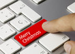 Merry Christmas keyboard. Finger
