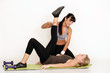 Dehnübung mit einem Personal Trainer
