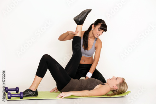 Photo: Dehnübung mit einem Personal Trainer Dehnübung mit einem Personal Trainer