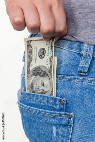 Photo: Hand mit Dollar Geldschein Hand mit Dollar Geldschein