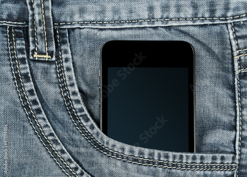 Photo: graded-screen smartphone in your pocket gray jeans graded-screen smartphone in your pocket gray jeans