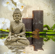 Buddha mi Orchidee weiß mit Bambus und Kerzen und Steinen
