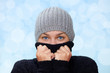 Photo: Young woman with pullover and cap in winter Young woman with pullover and cap in winter